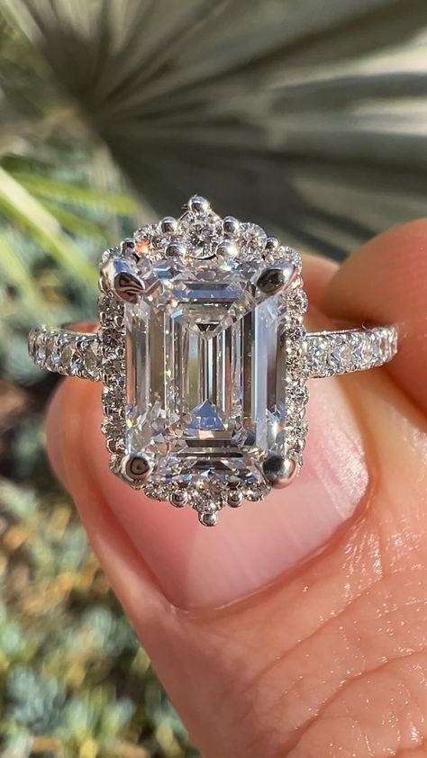 Unveiling elegance with our stunning 2 carat emerald cut diamond halo engagement ring. 💍 | Instagram Emerald Diamond Ring Engagement, Emerald Cut Engagement Ring With Halo, Engagement Ring Instagram, Emerald Halo Engagement Ring, Halo Engagement Ring Emerald, Emerald Cut Halo, Emerald Cut Rings, Diamond Halo Engagement Ring, Emerald Diamond Ring