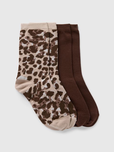 Soft, stretch cotton-blend crew socks.  Ribbed top.  Reinforced toe and heel.  Allover leopard print.  Made with 27% recycled polyester.  Compared to virgin materials, using recycled materials helps to reduce resource use and waste.  This product was made in a factory that invests in gender equality and women’s empowerment.  Through RISE Reimagining Industry to Support Equality) and Gap Inc. ’s program P. A. C. E.  Personal Advancement & Career Enhancement), we support people who make our clothe Lip Combos, Gift Inspo, Brand Collaboration, Gender Equality, Support People, Ribbed Top, Christmas 2024, New Woman, Recycled Materials