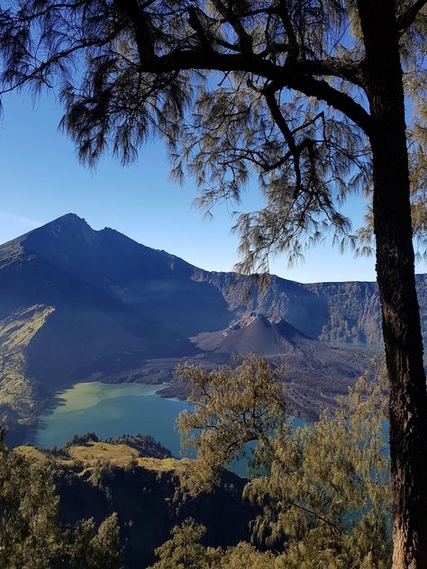 Absolute serenity from Senaru Crater Rim Mt Rinjani Lombok Indonesia Gunung Rinjani Aesthetic, Rinjani Mountain Wallpaper, Indonesian Aesthetic, Rinjani Mountain, Air Travel Tips, Adventure Landscape, Flowers Photography Wallpaper, Mountain Wallpaper, Top Travel Destinations