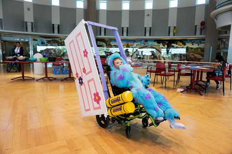 Monsters Inc wheelchair costume Popcorn Costume, Mardi Gras Diy, Wheelchair Costumes, Amazing Costumes, The Batmobile, Costumes For Halloween, Colored Tape, Book Week Costume, Disney Monsters