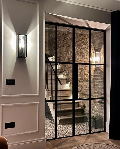 And the texture of the wall and flooring outside, love. 25 Beautiful Homes, Basement Flat, Basement Doors, London House, Iron Railing, Interior Stairs, Basement Design, Beautiful Lighting, Stairs Design