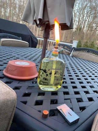 Diy Oil Lamp, Bottle Torch, Crushed Granite, Outdoor Shed, Patron Bottle, Liquor Bottle Crafts, Drainage Pipe, Citronella Oil, Bottle Candles