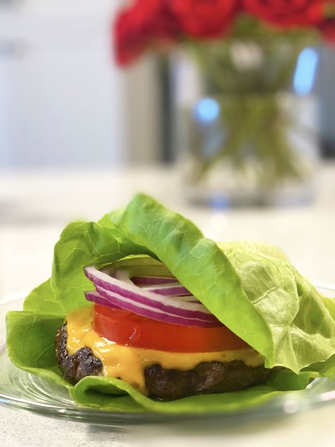 If you know me, you know I LOVE cheeseburgers. This butter lettuce wrapped cheeseburger is to die for! I'm so excited about this! Kicking the bun for some butter lettuce, makes that classic, not-so-healthy cheeseburger, well...healthyish. And the best part, it couldn't be easier to make. How To Make A Lettuce Wrap Burger, Burger Lettuce, Lettuce Wrap Burger Healthy, Lettuce Wrapped Cheeseburger, Burgers With Lettuce Buns, Lettuce Burgers, Lettuce Wrapped Burger, Beef Lettuce Wraps, Grilled Burgers