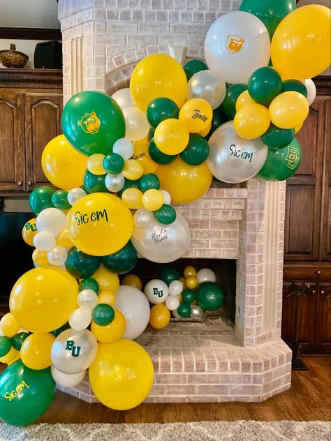 Masters Theme Balloon Arch, Fireplace Balloons, Baylor Graduation Party, University Of Michigan Party Decorations, Green And Yellow Party, Baylor Grad Party, Green And Yellow Graduation Party Decor, Pot Of Gold Balloons, Green Yellow Orange Balloon Garland