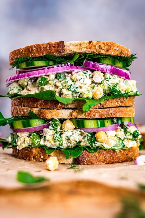 This Smashed Chickpea Salad features crisp veggies, tangy feta, briny capers and loads of fresh herbs, tossed with protein-packed chickpeas in a zingy lemon dressing. The perfect vegetarian lunch, dinner or cookout side dish. Made with just 8 simple ingredients and ready in 15 minutes! Smashed Chickpea Wrap, Smashed Chickpea Sandwich, Vegetarian Lunch Meal Prep, Simple Vegetarian Lunch, Chickpea Lunch, Chickpea Salad With Feta, Smashed Chickpea Salad, Smashed Chickpea, Catering Recipes