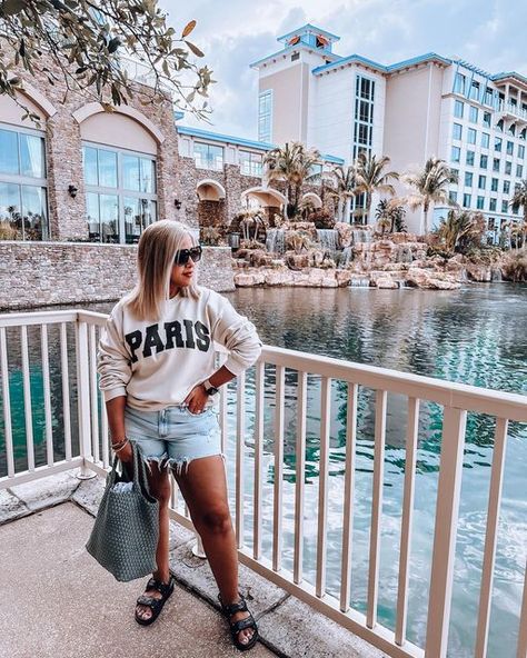 LENA | FASHION & STYLE | 📍FL on Instagram: "Florida Vibes 🌴☀️😎 . . . . . Everything linked on LTK https://liketk.it/45s06 Comment LINKS to receive a DM with outfit links Click the link in my bio, then click “shop my Instagram outfits on LTK” . . . . Florida vacation, Orlando vacation, universal resort Orlando, spring style, spring outfit, spring sweatshirt, Abercrombie shorts, curve love denim shorts, Chanel dad sandals, summer style" Dad Sandals Outfit Women, Chanel Dad Sandals Outfit, Dad Sandals Outfit, Chanel Dad Sandals, Florida Vibes, Universal Resorts, Abercrombie Shorts, Outfit Links, Spring Sweatshirt