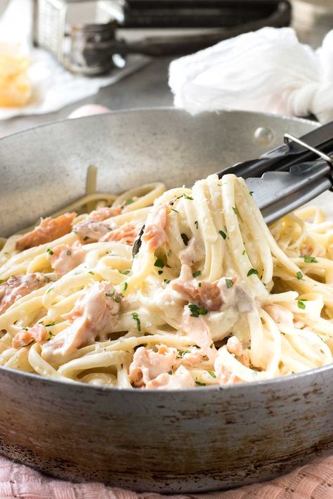 Pasta tossed with a creamy parmesan sauce and flakes of salmon. Alfredo pasta made the real proper restaurant way, you only need 1/2 cup of cream to serve 3. It’s simple, it’s magic, it’s the... Read More » Salmon Alfredo Pasta, Salmon Alfredo, Salmon Pasta Recipes, Sauce Pasta, Recipetin Eats, Recipe Tin, Alfredo Sauce Recipe, Salmon Pasta, Parmesan Sauce