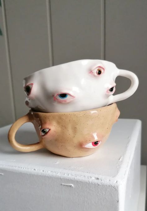 Creepy Ceramics Ideas, Weird Ceramic Art, Creepy Mugs, Weird Clay Ideas, Monster Mugs Ceramics, Horror Ceramics, Creepy Pottery, Monster Ceramics, Weird Clay Art