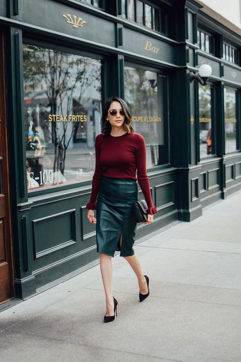 Lilly Beltran of Daily Craving styles a holiday ready look with a green leather skirt and bell sleeve sweater Green Leather Skirt Outfit, Fall Business Attire, Green Leather Skirt, Leather Skirt Outfit, Black Leather Skirt, Vegan Leather Skirt, Pencil Skirt Outfits, Leather Pencil Skirt, Camel Coat