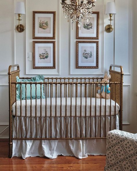 A truly tasteful nursery design by asliceopi on IG.   Featuring the Abigail Crib in Vintage Gold Crib Angled In Corner Of Nursery, Rod Iron Crib Nursery, Gender Neutral Classic Nursery, Metal Crib Nursery Girl Rooms, Vintage Chic Nursery, Nursery Old Money, Parisian Style Nursery, Traditional Baby Girl Nursery, Tasteful Nursery