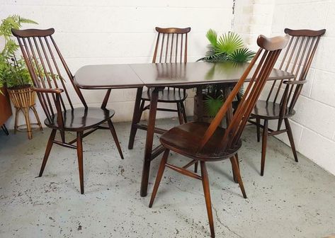 Vintage 1960's Ercol Dropleaf Dining Table & 4 Goldsmith Chairs Set Dark Stain | Ercol | Vinterior Table Banquette, Ercol Table, Antique Dining Tables, Dark Stains, Table And Chair Sets, Banquette, Dining Table Chairs, Table And Chairs, Chair Set