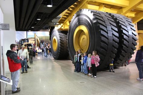 Big cat "This December 2012 photo shows equipment on display at the Caterpillar Visitors Center in Peoria, Ill. Caterpillar Inc. manufactures heavy equipment that bulldozes, digs, lifts and performs other tasks at construction and mining sites. The center lets visitors climb inside the machines for a closer look while computer simulations provide an opportunity to learn how to manipulate the controls. (AP Photo/Fritz Faerber)" Earth Moving Equipment, Heavy Haul, Tonka Toys, Heavy Construction Equipment, Automobile Engineering, Construction Machines, Tire Pressure Monitoring System, Mining Equipment, Truck Cranes