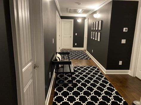 Beautiful matte black walls which white trim and doors. (PG black magic) Black Room White Trim, Black Room With White Trim, Black Walls With White Trim, Black Wall White Trim, Black Wall With White Trim, Black Walls White Trim, White Walls Black Trim, Black Hallway, Black Bedroom Decor