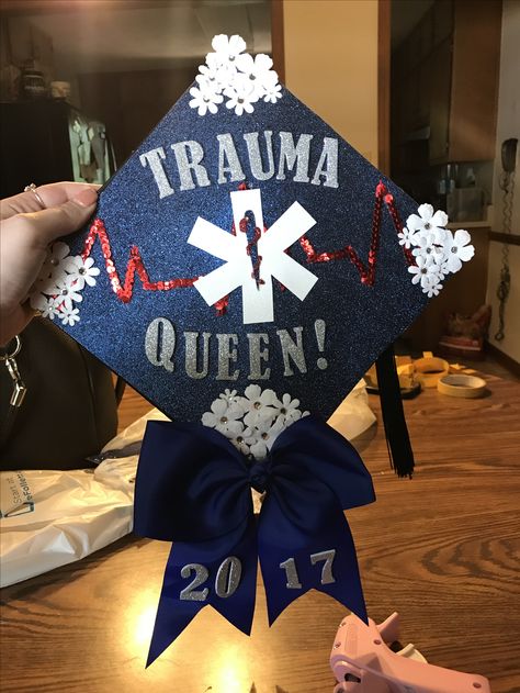 EMT Graduation Cap, Trauma Queen, Advanced EMT, AEMT, College graduation cap design  // follow us @motivation2study for daily inspiration Firefighter Graduation Cap, Ems Graduation Cap, Emt Cap Decoration, Graduation Cap Designs Medical School, Emt Party Ideas, Emt Graduation, Graduation Cap Medical, Emt Graduation Party Ideas, Emt Graduation Pictures