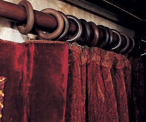 Wood rings at 8-in. intervals allow a portiere to slide freely in a pocket-door opening. Photo by Mark Lazzarini. 1920s Living Room Decor, Burgundy Curtains Living Room, Victorian Curtains, Burgundy Living Room, Door Colors, Velvet Drapes, Victorian Interiors, Arts And Crafts House, Front Door Colors