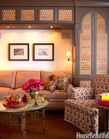 In this Moroccan-style family room, a small office is neatly tucked behind carved lattice doors, and the sofa pulls out for guests. Designed by Christopher Maya.   - HouseBeautiful.com India Decoration, Islamic Interior, Moroccan Inspiration, Moroccan Theme, Style Marocain, Moroccan Interiors, Dehradun, Moroccan Decor, Family Room Design