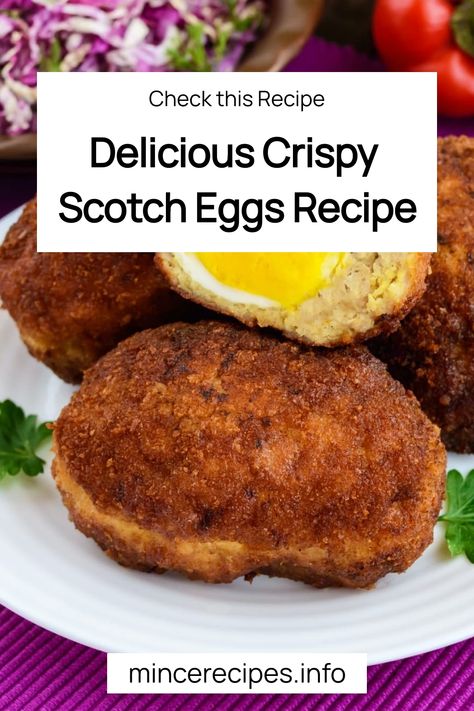 Delicious crispy Scotch eggs on a white plate, topped with a halved egg and garnished with parsley. Scotched Eggs, Scotish Eggs Recipe, Scotch Eggs Recipe Air Fryer, Air Fryer Scotch Egg Recipe, Scotch Eggs Recipe Baked, Scotch Eggs Baked, Vegetarian Scotch Eggs, Homemade Scotch Eggs, Pork Mince Recipes