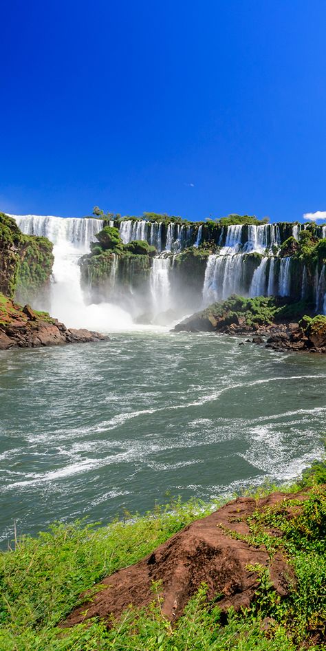 One of the world's most incredible waterfalls, Iguazu Falls sits on the border of Brazil and Paraguay #waterfall Waterfall Scenery, Waterfall Pictures, Iguazu Falls, Scenery Pictures, On The Border, Waterfall Photography, Beautiful Images Nature, Beautiful Photos Of Nature, Beautiful Waterfalls