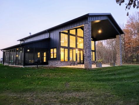 Barndominium Ideas Exterior Big Windows, Barndominium Indoor Outdoor Living, Dark Metal Barndominium, Glass Front Barndominium, Black Modern Barndominium, Lake Barndominium Ideas, Modern Mountain Barndominium, Lakehouse Barndominium, Sadler Barndominium