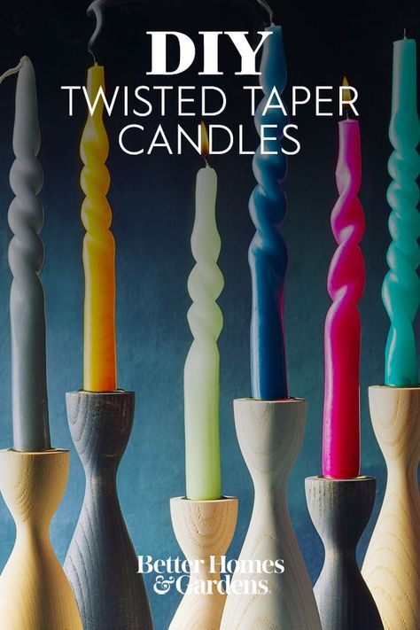 After a quick soak in hot water, it's easy to twist a plain taper candle into a sculptural piece of table decor. Create an inexpensive holiday centerpiece by grouping several candles together on a tray. Get creative when twisting and shaping your candles, the design options are endless. #twistedcandles #diytwistedcandles #diy #diyideas #bhg Christmas Tapered Candles, Taper Candle Making, Making Taper Candles, Decorating With Taper Candles, Taper Candle Crafts, Shaping Candles, Candle Stick Crafts, Diy Twisted Candles, Diy Taper Candle Holders