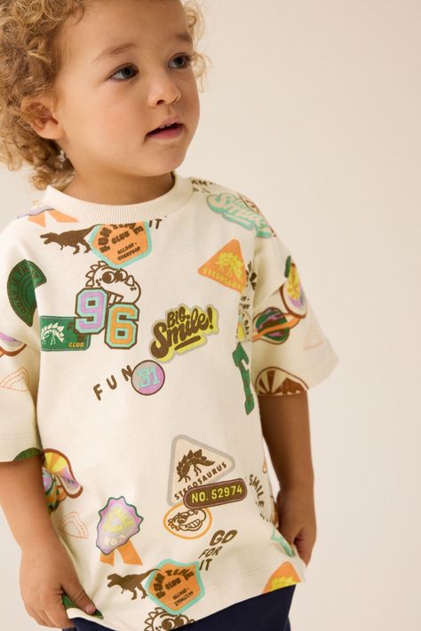 Buy Ecru Badges Short Sleeve Varsity T-Shirt (3mths-7yrs) from the Next UK online shop Boys Prints, Night Suit, Shirt Print Design, Boys Sweatshirts, Boy Tees, Girls Wear, Boys Shirts, Boys T Shirts