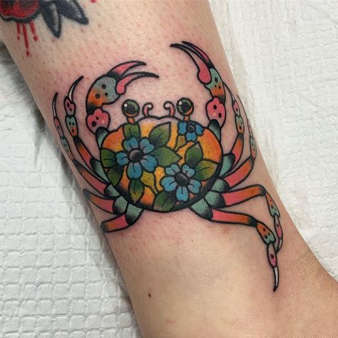 Floral crab tattoo Colorful Crab Tattoo, Old School Crab Tattoo, Crab Neck Tattoo, Neotraditional Crab Tattoo, Crab Flower Tattoo, Neo Traditional Crab Tattoo, Blue Crab Tattoo For Women, Heikegani Tattoo, Traditional Crab Tattoo