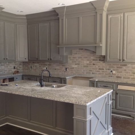 Love the brick backsplash color against the grey cabinets Cost Of Kitchen Cabinets, Brick Backsplash Kitchen, Small Bedroom Remodel, Budget Kitchen Remodel, Brick Backsplash, Gray Cabinets, Bedroom Remodel, New Kitchen Cabinets, Grey Kitchen Cabinets