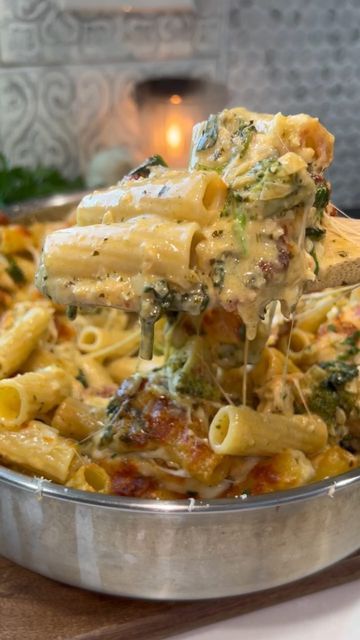 Eat For Cheap on Instagram: "CREAMY PESTO CHICKEN & BROCCOLI PASTA BAKE 🔥 (credit: @heresyourbite) SMASH OR PASS?!

Send this to someone who should make this! Full recipe below:

INGREDIENTS

1lb pasta of choice
1/3 cup sun-dried tomatoes + oil
1lb chicken 
1 tbsp butter
1/2 yellow onion, diced
Salt and pepper, to taste
Paprika, to taste
Oregano, to taste
@tonychacheres , to taste
1 head of garlic, minced (or to taste)
2 cups heavy cream
1-2 cups cooked broccoli, to taste
2 handfuls spinach
2 cups freshly shredded parmesan cheese
2 cups shredded mozzarella
1/2 cup pesto, to taste
Parsley to garnish

STEPS

1. Preheat oven to 350F
2. Boil noodles in salted water until al dente. Drain and set aside.
3. In a large (oven-safe) saucepan or dutch oven, heat about 1 tbsp of sun-dried tomato oil Pesto Chicken And Broccoli, Chicken Broccoli Pasta Bake, Chicken And Broccoli Pasta, Creamy Pesto Chicken, Broccoli Pasta Bake, Chicken Broccoli Pasta, Favorite Pasta Recipes, Creamy Pesto, Broccoli Pasta