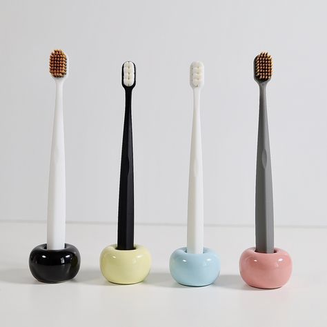 Creative ceramic toothbrush holder with simple but elegant design. Holds the manual (not electric) toothbrush to keep it clean and stylish Dimensions Overall: 1.6" diam (outer), 07" diam (inner), 1.1" h Weight: 2.7 oz Care Clean with water Fun Toothbrush Holder, Air Dry Clay Toothbrush Holder, Toothbrush Aesthetic, Pottery Toothbrush Holder, Toothbrush Design, Ceramic Toothbrush Holder, Electric Toothbrush Holder, Apartment Hacks, Toothbrush Holders