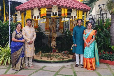 Mallik Kankatala with his wife Silpa, son Anirudh and daughter-in-law Sonika. Bhogi 2019 was special - it being Sonika's first Bhogi as a member of the Kankatala family. Silpa looks gorgeous in a blue Kanchipuram self zari saree with Bandhini. And Sonika dazzles in a sku blue Kanchipuram Kora organza with korvai orange zari border and pallu.   . . . . #Bhogicelebrations #Bhogi2019 #Makarasankranti #Kankatalafamily #Kankatala Leaf Toran, South Indian Bridal Sarees, Zari Saree, Kanchi Pattu Sarees, Indian Bridal Sarees, Jewelry Hair Accessories, Orange Blouse, Colour Combo, Bridal Blouse Designs