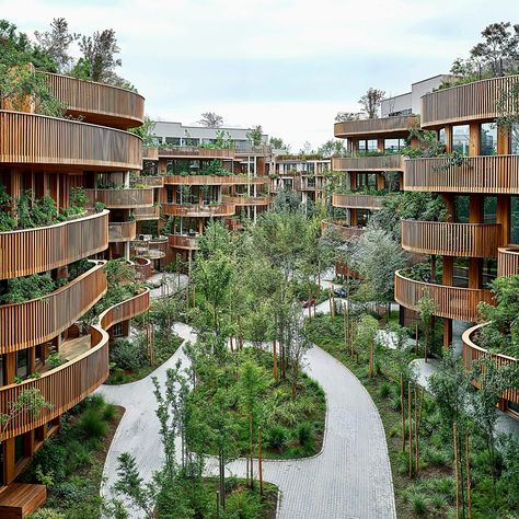 We’d like to see design examples focused on eco-friendly materials, presenting a mixed-use project where green elements and wood meet.🌿💚 Sustainable material choices are always warm and vibrant, but they often face fewer opportunities for actual construction compared to others. In this context, the grouping of low and high-rise residential buildings with shared spaces appeared quite simple and feasible to us. We look forward to your comments.🍃💚 #sustainability #sustainable #sustainabledes... Mixed Use, Building Facade, Residential Building, Beautiful Space, Sustainable Design, Sustainable Materials, Urban Design, Sustainability, Tower