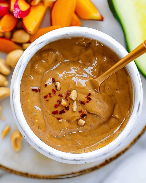 Best Thai Peanut Sauce: The Perfect Blend of Sweet, Savory, and Spicy If you’re a fan of Thai cuisine, you know that the magic often lies in the sauces. Thai ... Read more Tofu Peanut Noodles, Peanut Thai Sauce, Thai Peanut Tofu, Peanut Sauce Thai, Peanut Sauce Stir Fry, Satay Noodles, Spring Roll Sauce, Peanut Sauce Noodles, Peanut Curry