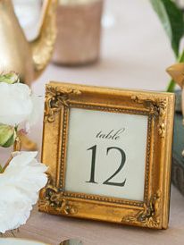 Formal gold frame 4" with custom printed table number by M. Design Gold Photo Frame Table Numbers, Table Numbers In Gold Frames, Gold Picture Frame Table Numbers, Gold Framed Table Numbers, Gold Frame Table Numbers Wedding, Gold Frame Table Numbers, Hotel Wedding Ceremony Decorations, Framed Table Numbers Wedding, Planning 2023