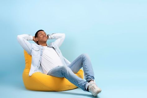 Photo studio portrait of relaxed cheerfu... | Premium Photo #Freepik #photo #man-smiling #man-background #young-man #man-holding Man Relaxing, Watermark Ideas, Human Icon, Graphic Design Assets, Happy Man, Laundry Design, Graphics Design Ideas, Graphic Design Course, Graphic Design Flyer