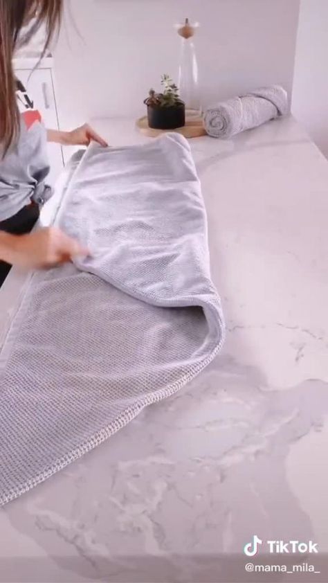 Mum shares space-saving trick on how to fold towels and it makes your bathroom look like a spa Space Saving Folding Towels, Folding Large Bath Towels, How To Fold A Beach Towel, Spa Towel Folding, Folding Towels Save Space, How To Fold Towels To Save Space, Fold Towels To Save Space, Folding Bath Towels, Fold Hand Towels