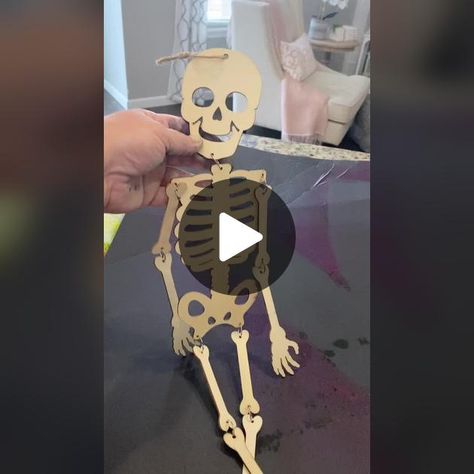 Dollar tree wooden skeleton used as template to paint on shirt. #dolla... | TikTok Dollar Tree Skeleton Diy, Make A Skeleton Projects, Pallet Skeleton, Halloween Pallet Skeleton, Dollar Tree Skeleton Crafts, Paint On Shirt, Wood Skeleton Craft, Dollar Tree Wooden Skeleton, Skeleton Crafts