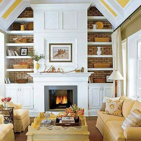 Pretty Builtin Bookcases with a brick back!!! Bebe'!!! So sunny and bright!!! Bookshelves Around Fireplace, Salons Cottage, Brick Wall Living Room, Mantle Decorating, Built In Around Fireplace, Brick Living Room, Random Decor, Mantle Ideas, Decor Images