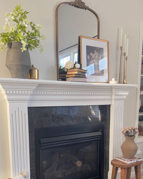 Home takes time… I figure this fireplace deserved a spot on my grid before I restyle it! I love redesigning my home and love bringing inspiration and ideas for your home! Big CHANGES are coming to my home so love to have you come along for the process! Have a beautiful Friday! Living room view | Vase | Target | Storage Books | Hobby Lobby | Artwork | PaperHouse Print Shop| Picture Frame | Homegoods | Tall Candlestick | Hobby Lobby | Small Candle Holder | AtHome | Wood Stool| Target . .... Everyday Mantel Decor, Mirror Mantle Decor, Above Mantel Decor, Tv Mantle Decor, White Mantle Decor, Mantle Decor With Mirror, Lobby Artwork, Simple Mantle Decor, Simple Mantle