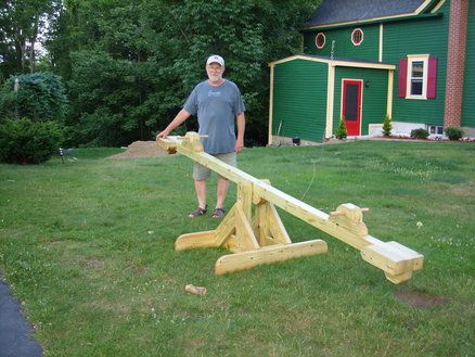 Another seesaw design.  I like the heavier lumber to match the swing set. See Saw Design, Kids Seesaw, Science Games For Kids, See Saw, Teeter Totter, Kids Outdoor Furniture, Diy Playground, Cornhole Game, Safe Room