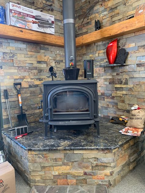 Wood stove raised hearth Raised Wood Stove, Wood Stove Surround Corner, Wood Stove Corner Ideas, Corner Wood Burning Stove, Woodstove Ideas, Fireplace Cabin, Wood Burning Stove Corner, Corner Wood Stove, Wood Stove Surround