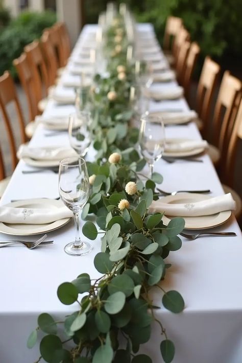 22 Simple Wedding Centerpieces That’ll Wow Your Guests Table Decorations With Eucalyptus, Fake Greenery Wedding Centerpieces, Simple Wedding Centerpieces For Rectangle Table, Simple Table Decorations Wedding Budget, Eucalyptus Table Centerpiece, Greenery For Wedding Tables, Simple Long Table Centerpieces, Herb Centerpiece Wedding, Simple Wedding Flower Arrangements