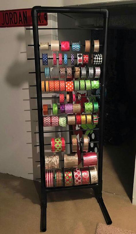 Pvc and wood dowels make a nice ribbon rack Ribbon Holder Diy, Diy Ribbon Holder, Ribbon Rack, Wood Storage Rack, Ribbon Holders, Ribbon Organization, Sewing Room Storage, Ribbon Storage, Pvc Pipes