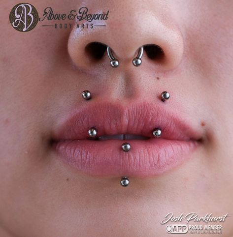 "Angel Fangs" aka Paired Vertical Upper Lip piercings are all the rage these days! We especially love these on Cleo paired with their existing Vertical Labret, all performed by Josh! The symmetry is STUNNING 🙌 Pierced with all @anatometalinc implant-grade titanium to match their all silver-toned look 🩶 We can't wait to see what these looked like downsized! Thanks Cleo! 📷: @50percentsnakes . . . #piercing #piercer #bodypiercer #bodypiercing #lippiercing #verticallabret #angelfangs #angelbit... Angel Bites And Vertical Labret, Angel Fangs Piercing With Snake Bites, Both Eyebrows Pierced, Vertical Snakebites, Angel Fangs Piercing, Angel Fangs, Angel Bites Piercing, Angel Bites, Upper Lip Piercing