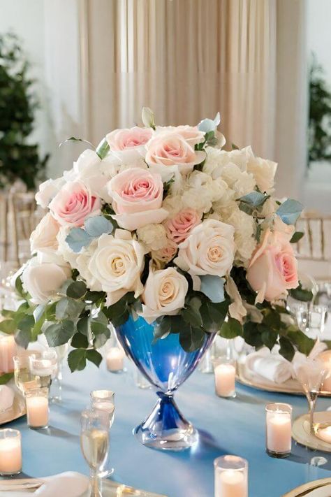 Blue vase centerpiece with white and pink flowers on water Blue Vase Centerpieces, Fall Ambiance, Lisianthus Flowers, Wedding Centerpiece Ideas, Elements Of Drama, Jasmine Vine, White And Pink Flowers, Vase Centerpiece, Blue Palette