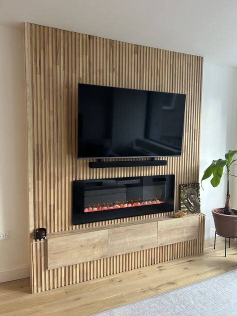 Slat Wall Fireplace, Pole Wrap Ideas, Wood Fireplace Wall, Rec Room Remodel, Napa House, Space Interior Design, Diy Luxury, Basement Fireplace, Feature Wall Living Room