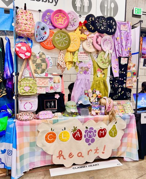 anime expo day one 💛 despite all the challenges i’m happy to be here!! come say hello! 🫶🏻 we got brand new: reusable tote bags, bonnets, mini prints, stickers, bucket hats, and baseball caps! 👀 — #animeexpo #animeexpo2024 #animeexpo24 #axartistalley #ax2024 Art Festival Booth Display, Festival Booth Display, Art Festival Booth, Art Fair Booth, Craft Fair Booth Display, Festival Booth, Craft Market Display, Craft Fairs Booth, Craft Booth Displays