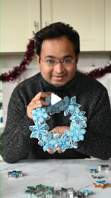 190K views · 20K likes | Dr Rahul Mandal on Instagram: "Hope you all had a lovely Christmas   We had a nice Christmas meal on Christmas eve. Shreya doesn't like turkey, so we had roast chicken with lots of sides. Christmas day was a quiet one, so thought to bake something fun.  Hence this #gingerbread #snowflake wreath. I baked the wreath with some biscuits, but I think it will be better, if you bake the base of the wreath separately and then stick the biscuits on top.  I decided to ice individual snowflakes, with different shades of blues and whites. But you can just ice them with white #royalicing .   Also you need to resiste the temptation of lifting the wreath till the icing is completely set.   There is something about gingerbread, that instantly brings festivity to our home. Hope you Biscuit Wreath, Bake Something, Christmas Meal, Snowflake Wreath, Crafts Christmas, Roast Chicken, Christmas Day, Royal Icing, Christmas Eve