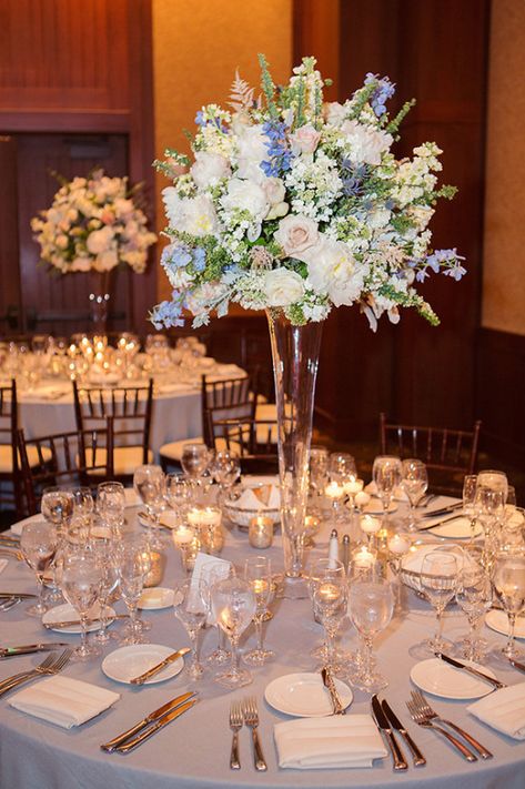 Dusty Blue And White Wedding Decor, Blue And White Flower Arrangements Centerpieces, Elegant Blue Wedding Theme, White And Blue Centerpieces Wedding, White And Blue Wedding Centerpieces, Wedding Flowers For Tables, Blue And White Wedding Centerpieces, Tall Wedding Centerpieces Elegant, Blue And White Centerpieces