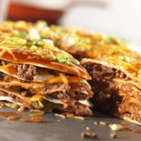 Enchilada Stack, Stacked Enchiladas, Cheesy Enchiladas, Cheese Enchiladas, Beef Enchiladas, Shredded Cheddar Cheese, Mexican Foods, South Of The Border, Enchilada Sauce