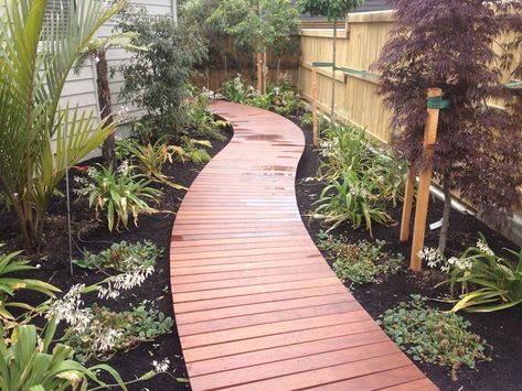 Wooden Walkway Inspiration Ideas 💭🌳🌺🪨🌾🌴 #Landscaping #Ideas #WoodenWalkway #Walkways #Pathways #Boardwalk #Garden #GardenPath #GardenMakeover #GardenInsparation #GardenIdeas #BeautifulGarden #HomeAndGarden #PatioGarden #Patio #PatioIdeas #PatioDecor #PatioDesign #PatioInspiration #BackyardInsparation #BackyardGarden #Backyard #BackyardBliss #BackyardOasis #BackyardGoals #BackyardLiving #GardenLiving #OutdoorLiving #MitchsBackyard #FollowUs Pool Privacy, Outdoor Fire Pit Area, Outdoor Improvements, Wood Walkway, Board Walk, Backyard Walkway, Walkway Landscaping, Front Walk, Walkways Paths